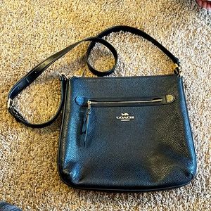 Coach black crossbody purse. Barely used. One pocket on the  inside.